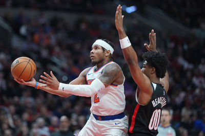 Mar 12, 2025; Portland, Oregon, USA; New York Knicks point guard Miles McBride (2) shoots the ball against Portland Trail Blazers guard Scoot Henderson (00) during the second half at Moda Center. Mandatory Credit: Soobum Im-Imagn Images