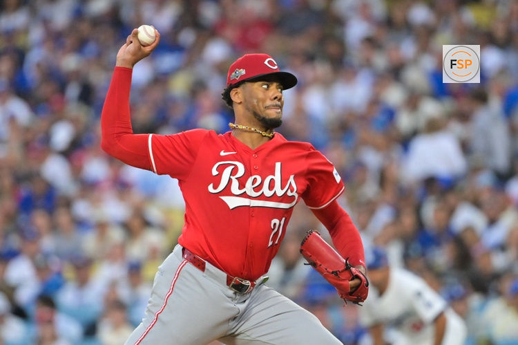 Sep 30, 2025; Los Angeles, California, USA; Cincinnati Reds starting pitcher Hunter Greene (21) throws a pitch during the first inning against the Los Angeles Dodgers during game one of the Wildcard round for the 2025 MLB playoffs at Dodger Stadium. Credit: Jayne Kamin-Oncea-Imagn Images