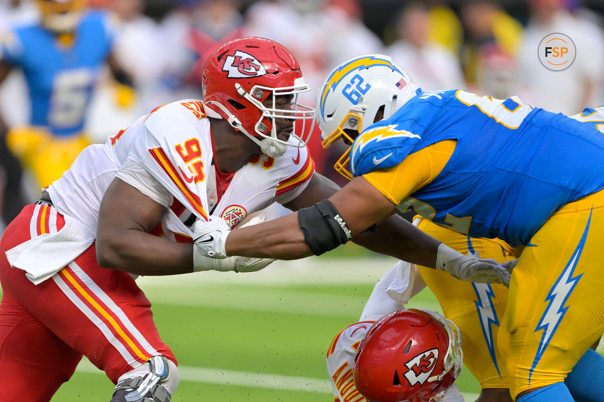 Sep 29, 2024; Inglewood, California, USA;  Kansas City Chiefs defensive tackle Chris Jones (95) and Los Angeles Chargers center Sam Mustipher (62) battle at the line in the second half at SoFi Stadium. Credit: Jayne Kamin-Oncea-Imagn Images