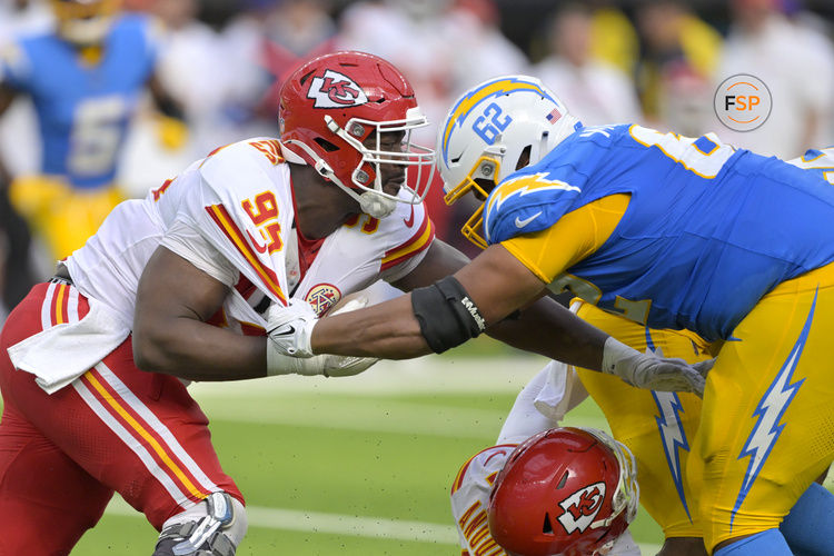 Sep 29, 2024; Inglewood, California, USA;  Kansas City Chiefs defensive tackle Chris Jones (95) and Los Angeles Chargers center Sam Mustipher (62) battle at the line in the second half at SoFi Stadium. Credit: Jayne Kamin-Oncea-Imagn Images