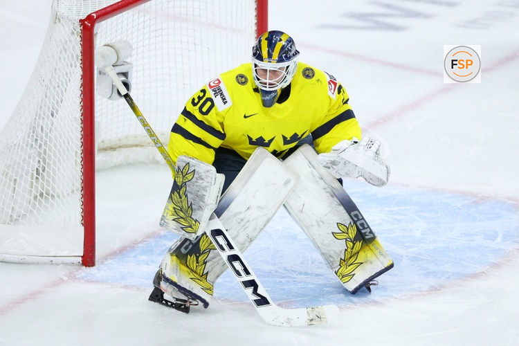 Jan 2, 2026; St. Paul, Minnesota, UNITED STATES; Sweden goalie Love Harenstam (30) defends his net against Latvia during the first period in the quarterfinals of the 2026 IIHF World Junior Championship at Grand Casino Arena. Credit: Matt Krohn-Imagn Images
