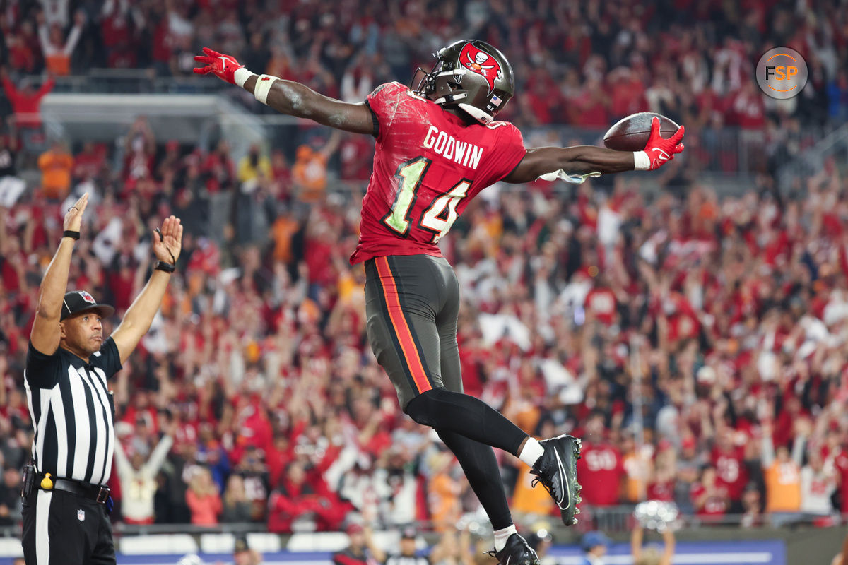 Jan 15, 2024; Tampa, Florida, USA; Tampa Bay Buccaneers wide receiver Chris Godwin (14) celebrates his touchdown against the Philadelphia Eagles during the second half of a 2024 NFC wild card game at Raymond James Stadium. Credit: Kim Klement Neitzel-USA TODAY Sports