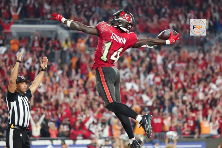 Jan 15, 2024; Tampa, Florida, USA; Tampa Bay Buccaneers wide receiver Chris Godwin (14) celebrates his touchdown against the Philadelphia Eagles during the second half of a 2024 NFC wild card game at Raymond James Stadium. Credit: Kim Klement Neitzel-USA TODAY Sports