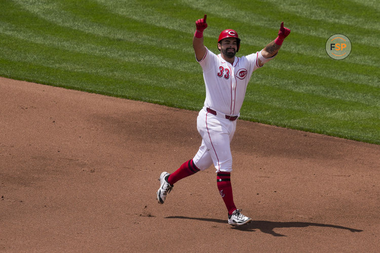 Jun 8, 2025; Cincinnati, Ohio, USA; Cincinnati Reds first baseman Christian Encarnacion-Strand (33) gestures as he runs the bases after hitting a solo home run against the Arizona Diamondbacks in the fourth inning at Great American Ball Park. Credit: Aaron Doster-Imagn Images