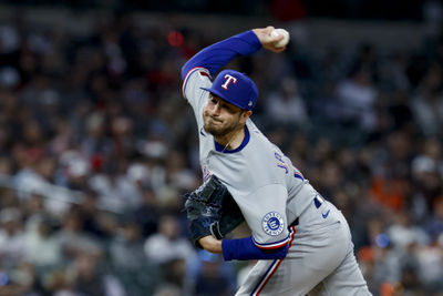 May 10, 2025; Detroit, Michigan, USA;  Texas Rangers relief pitcher Luke Jackson (77) pitches in the ninth inning against the Detroit Tigers at Comerica Park. Mandatory Credit: Rick Osentoski-Imagn Images