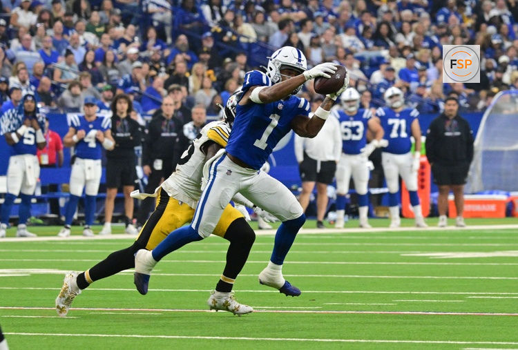 Sep 29, 2024; Indianapolis, Indiana, USA; Indianapolis Colts wide receiver Josh Downs (1) catches a pass in front of Pittsburgh Steelers safety DeShon Elliott (25) during the second quarter at Lucas Oil Stadium. Credit: Marc Lebryk-Imagn Images
