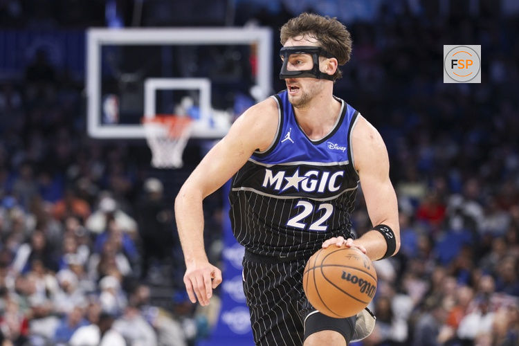 Dec 3, 2025; Orlando, Florida, USA; Orlando Magic forward Franz Wagner (22) controls the ball against the San Antonio Spurs in the third quarter at Kia Center. Credit: Nathan Ray Seebeck-Imagn Images