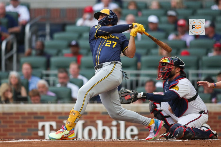 Aug 6, 2024; Atlanta, Georgia, USA; Milwaukee Brewers shortstop Willy Adames (27) hits a two-run home run against the Atlanta Braves in the first inning at Truist Park. Credit: Brett Davis-USA TODAY Sports