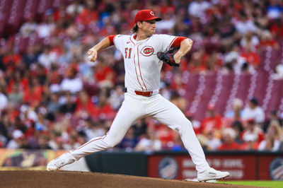 Jul 7, 2025; Cincinnati, Ohio, USA; Cincinnati Reds starting pitcher Brady Singer (51) pitches against the Miami Marlins in the first inning at Great American Ball Park. Mandatory Credit: Katie Stratman-Imagn Images