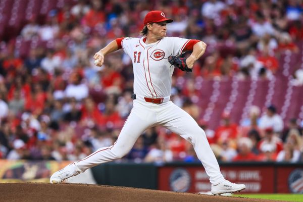Jul 7, 2025; Cincinnati, Ohio, USA; Cincinnati Reds starting pitcher Brady Singer (51) pitches against the Miami Marlins in the first inning at Great American Ball Park. Mandatory Credit: Katie Stratman-Imagn Images