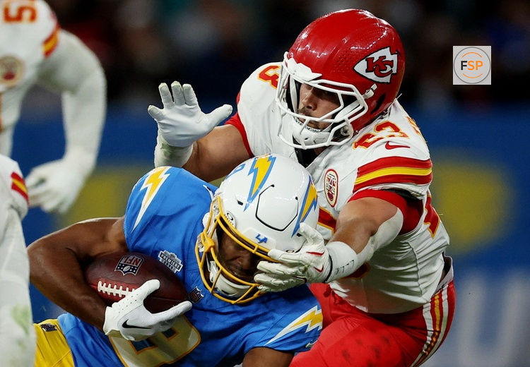 [US, Mexico & Canada customers only] Sep 5, 2025; Sao Paulo, BRAZIL; Los Angeles Chargers running back Omarion Hampton (8) runs against Kansas City Chiefs linebacker Drue Tranquill (23) in the second half during a NFL game at Corinthians Arena. Credit: Amanda Perobelli/Reuters via Imagn Images