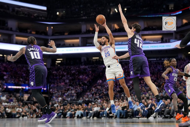 Nov 7, 2025; Sacramento, California, USA; Oklahoma City Thunder guard Ajay Mitchell (25) passes the ball away from the reach of Sacramento Kings center Maxime Raynaud (42) in the fourth quarter at the Golden 1 Center. Credit: Cary Edmondson-Imagn Images