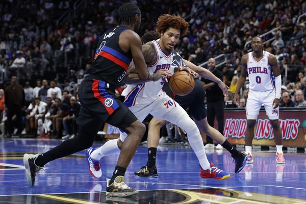 Nov 14, 2025; Detroit, Michigan, USA;  Philadelphia 76ers guard Kelly Oubre Jr. (9) dribbles defended by Detroit Pistons guard Caris LeVert (8) in the first half at Little Caesars Arena. Mandatory Credit: Rick Osentoski-Imagn Images