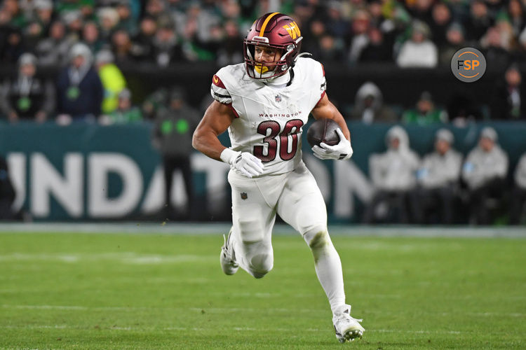 Nov 14, 2024; Philadelphia, Pennsylvania, USA; Washington Commanders running back Austin Ekeler (30) against the Philadelphia Eagles at Lincoln Financial Field. Credit: Eric Hartline-Imagn Images