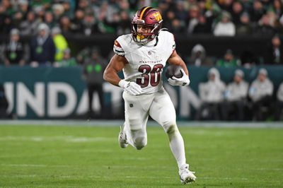 Nov 14, 2024; Philadelphia, Pennsylvania, USA; Washington Commanders running back Austin Ekeler (30) against the Philadelphia Eagles at Lincoln Financial Field. Mandatory Credit: Eric Hartline-Imagn Images