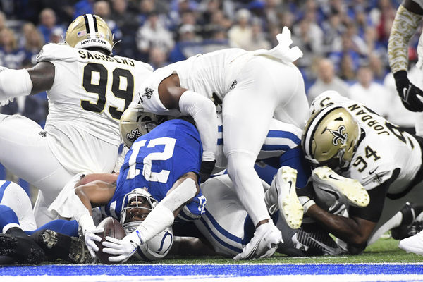 INDIANAPOLIS, IN - OCTOBER 29: Indianapolis Colts Running Back Zack Moss (21) stretches the ball across the goal line during the NFL game between the New Orleans Saints and the Indianapolis Colts on October 29, 2023, at Lucas Oil Stadium in Indianapolis, Indiana. (Photo by Michael Allio/Icon Sportswire)