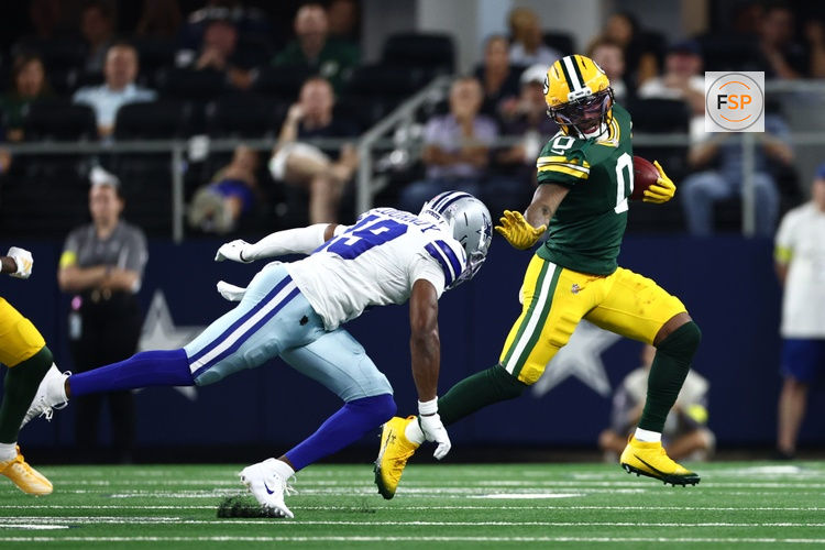 Sep 28, 2025; Arlington, Texas, USA; Green Bay Packers wide receiver Matthew Golden (0) runs against Dallas Cowboys wide receiver Ryan Flournoy (19) in the first quarter at AT&T Stadium. Credit: Kevin Jairaj-Imagn Images