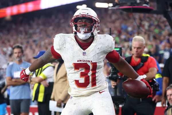 Sep 25, 2025; Glendale, Arizona, USA;  Arizona Cardinals running back Emari Demercado (31) celebrates scoring a touchdown against the Seattle Seahawks in the fourth quarter at State Farm Stadium. Mandatory Credit: Mark J. Rebilas-Imagn Images