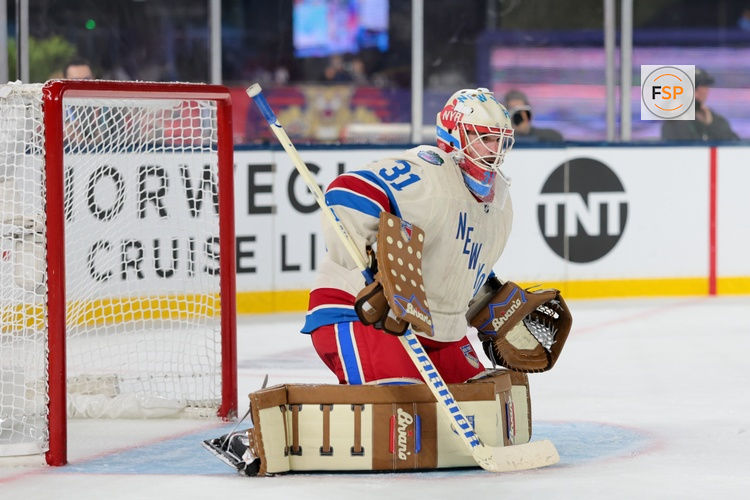 Jan 2, 2026; Miami, Florida, USA; New York Rangers goaltender Igor Shesterkin (31) defends the net against the Florida Panthers during the second period in the 2026 Winter Classic ice hockey game at loanDepot Park. Credit: Sam Navarro-Imagn Images