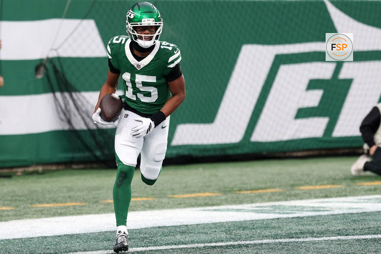 Nov 30, 2025; East Rutherford, New Jersey, USA;New York Jets wide receiver Adonai Mitchell (15) reacts after a touchdown catch against the Atlanta Falcons during the second half at MetLife Stadium. Credit: Vincent Carchietta-Imagn Images