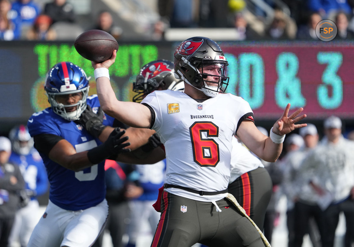 Nov 24, 2024; East Rutherford, New Jersey, USA; Tampa Bay Buccaneers quarterback Baker Mayfield (6) throws against the New York Giants during the first half at MetLife Stadium. Credit: Robert Deutsch-Imagn Images