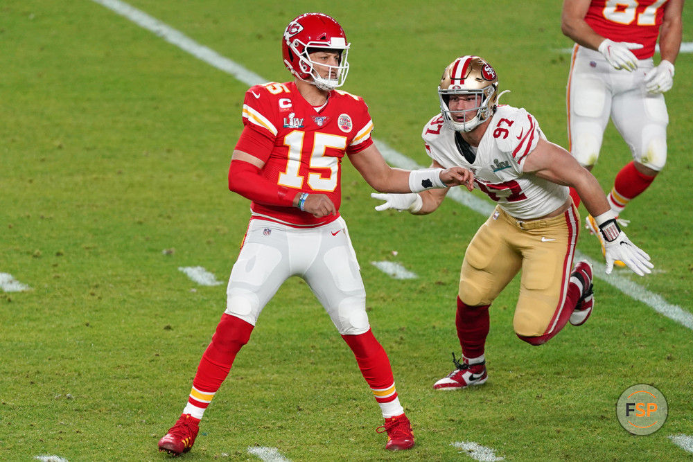 MIAMI GARDENS, FL - FEBRUARY 02: Kansas City Chiefs quarterback Patrick Mahomes (15) battles with San Francisco 49ers defensive end Nick Bosa (97) in game action during the Super Bowl LIV game between the Kansas City Chiefs and the San Francisco 49ers on February 2, 2020 at Hard Rock Stadium, in Miami Gardens, FL. (Photo by Robin Alam/Icon Sportswire)