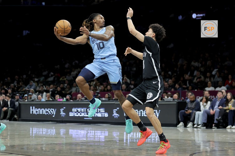 Mar 9, 2026; Brooklyn, New York, USA; Memphis Grizzlies guard Javon Small (10) looks to pass the ball against Brooklyn Nets guard Nolan Traore (88) during the second quarter at Barclays Center. Credit: Brad Penner-Imagn Images