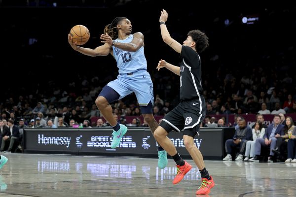 Mar 9, 2026; Brooklyn, New York, USA; Memphis Grizzlies guard Javon Small (10) looks to pass the ball against Brooklyn Nets guard Nolan Traore (88) during the second quarter at Barclays Center. Mandatory Credit: Brad Penner-Imagn Images