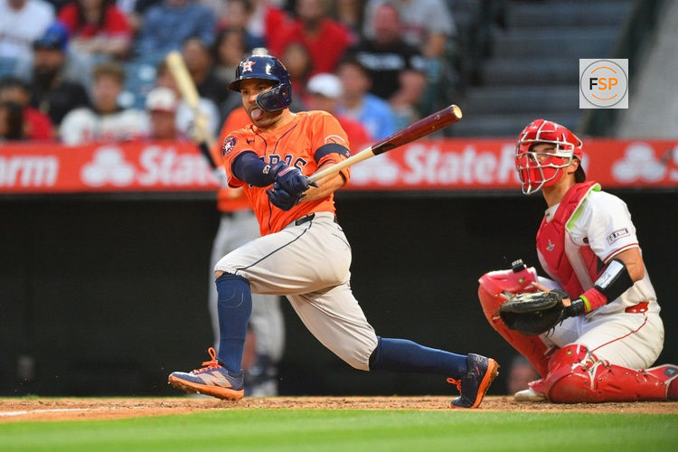 ANAHEIM, CA - JUNE 07: Houston Astros second baseman Jose Altuve (27) hits a ball down the line during the MLB game between the Houston Astros and the Los Angeles Angels of Anaheim on June 7, 2024 at Angel Stadium of Anaheim in Anaheim, CA. (Photo by Brian Rothmuller/Icon Sportswire)