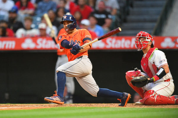 ANAHEIM, CA - JUNE 07: Houston Astros second baseman Jose Altuve (27) hits a ball down the line during the MLB game between the Houston Astros and the Los Angeles Angels of Anaheim on June 7, 2024 at Angel Stadium of Anaheim in Anaheim, CA. (Photo by Brian Rothmuller/Icon Sportswire)