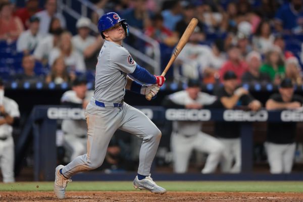 May 20, 2025; Miami, Florida, USA; Chicago Cubs third baseman Matt Shaw (6) hits an RBI double against the Miami Marlins during the sixth inning at loanDepot Park. Mandatory Credit: Sam Navarro-Imagn Images