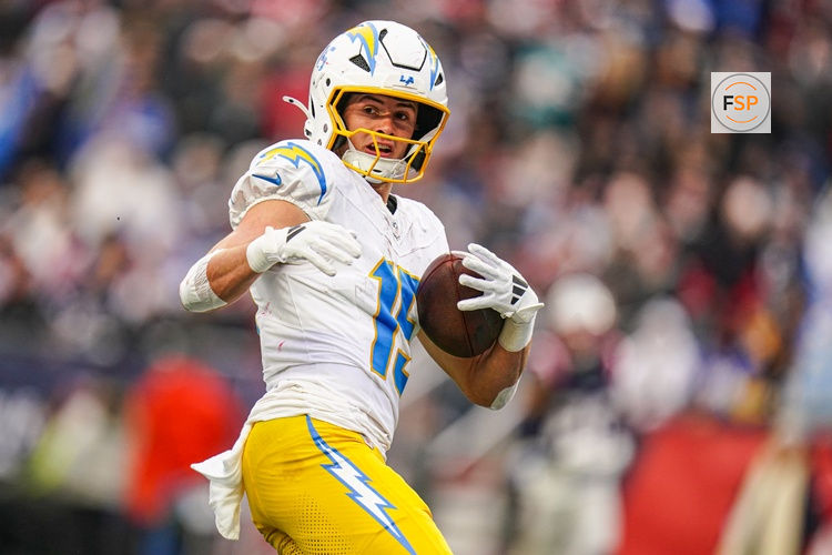 Dec 28, 2024; Foxborough, Massachusetts, USA; Los Angeles Chargers wide receiver Ladd McConkey (15) makes the touchdown catch against the New England Patriots in the third quarter at Gillette Stadium. Credit: David Butler II-Imagn Images
