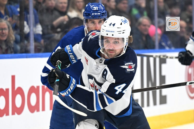 Jan 1, 2026; Toronto, Ontario, CAN;  Winnipeg Jets defenseman Josh Morrissey (44) pursues the play against the Toronto Maple Leafs in the third period at Scotiabank Arena. Credit: Dan Hamilton-Imagn Images
