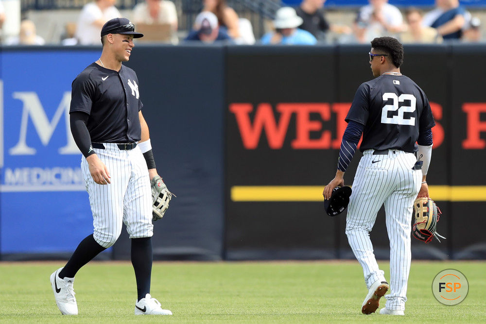 TAMPA, FL - MARCH 06: New York Yankees outfielders Aaron Judge (99) and Juan Soto (22) talk as they walk out to the outfield during the spring training game between the Tampa Bay Rays and New York Yankees on MARCH 06, 2024 at George M. Steinbrenner Field in Tampa, FL. (Photo by Cliff Welch/Icon Sportswire)