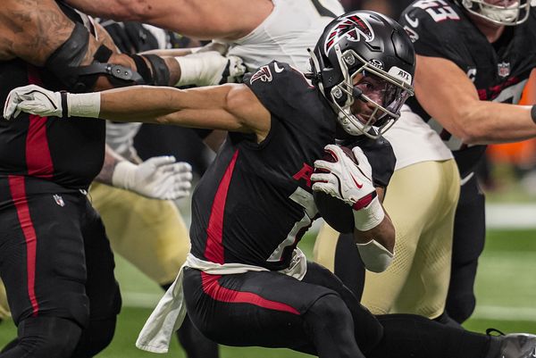 Jan 4, 2026; Atlanta, Georgia, USA; Atlanta Falcons running back Bijan Robinson (7) runs against the New Orleans Saints during the first half at Mercedes-Benz Stadium. Mandatory Credit: Dale Zanine-Imagn Images