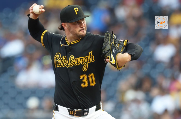 Jul 7, 2026; Pittsburgh, Pennsylvania, USA;  Pittsburgh Pirates starting pitcher Paul Skenes (30) pitches against the Atlanta Braves during the fourth inning at PNC Park. Credit: Charles LeClaire-Imagn Images