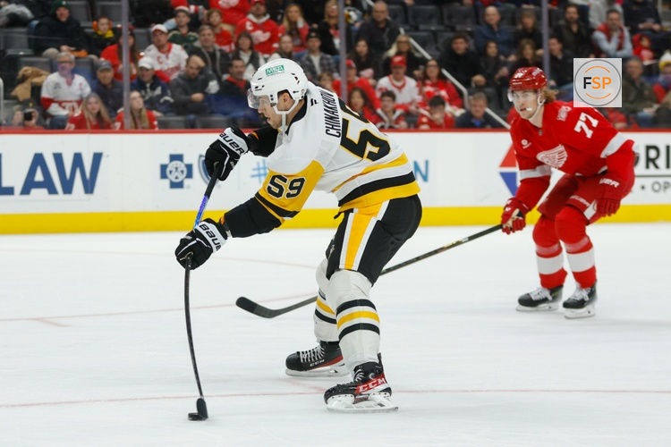 Jan 3, 2026; Detroit, Michigan, USA; Pittsburgh Penguins right wing Yegor Chinakhov (59) scores a goal in the first period against the Detroit Red Wings at Little Caesars Arena. Credit: Brian Bradshaw Sevald-Imagn Images