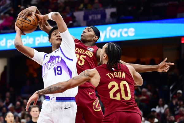 Jan 12, 2026; Cleveland, Ohio, USA; Cleveland Cavaliers forward Nae'qwan Tomlin (35) blocks the shot of Utah Jazz guard Ace Bailey (19) during the second half at Rocket Arena. Mandatory Credit: Ken Blaze-Imagn Images