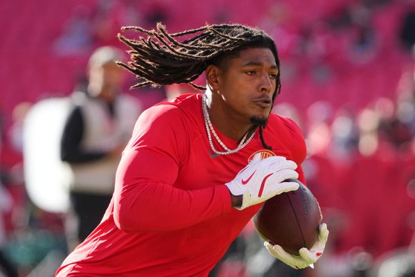 Oct 19, 2025; Kansas City, Missouri, USA; Kansas City Chiefs running back Isiah Pacheco (10) warms up prior to the game against the Las Vegas Raiders at GEHA Field at Arrowhead Stadium. Mandatory Credit: Denny Medley-Imagn Images