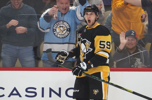 Mar 21, 2026; Pittsburgh, Pennsylvania, USA;  Pittsburgh Penguins right wing Egor Chinakhov (59) reacts after scoring a goal against the Winnipeg Jets during the first period at PPG Paints Arena. Mandatory Credit: Charles LeClaire-Imagn Images