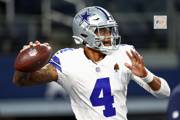 Aug 16, 2025; Arlington, Texas, USA;  Dallas Cowboys quarterback Dak Prescott (4) warms up before the game against the Baltimore Ravens at AT&T Stadium. Credit: Kevin Jairaj-Imagn Images