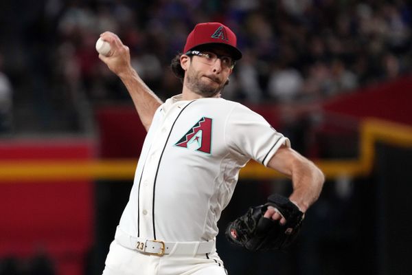 May 7, 2026; Phoenix, Arizona, USA; Arizona Diamondbacks pitcher Zac Gallen (23) throws against the Pittsburgh Pirates in the first inning at Chase Field. Mandatory Credit: Rick Scuteri-Imagn Images