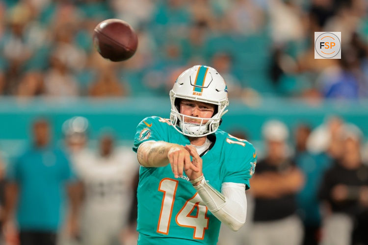 Aug 23, 2025; Miami Gardens, Florida, USA; Miami Dolphins quarterback Quinn Ewers (14) passes the football against the Jacksonville Jaguars during the fourth quarter at Hard Rock Stadium. Credit: Sam Navarro-Imagn Images