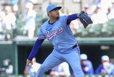 May 4, 2025; Arlington, Texas, USA;  Texas Rangers relief pitcher Luke Jackson (77) throws during the ninth inning against the Seattle Mariners at Globe Life Field. Mandatory Credit: Kevin Jairaj-Imagn Images