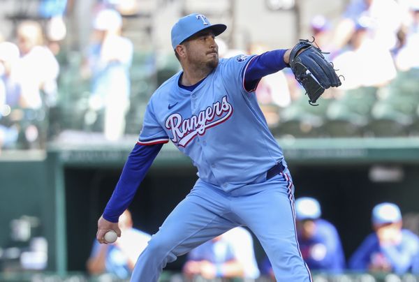 May 4, 2025; Arlington, Texas, USA;  Texas Rangers relief pitcher Luke Jackson (77) throws during the ninth inning against the Seattle Mariners at Globe Life Field. Mandatory Credit: Kevin Jairaj-Imagn Images