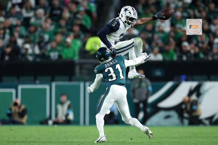 Oct 26, 2026; Philadelphia, Pennsylvania, USA;  Dallas Cowboys wide receiver George Pickens (3) attempts to leap over Philadelphia Eagles cornerback Jonathan Jones (31) during the second quarter at Lincoln Financial Field.  Credit: Bill Streicher-Imagn Images
