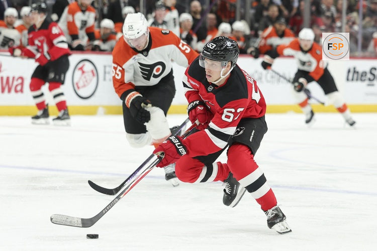 Apr 7, 2026; Newark, New Jersey, USA; New Jersey Devils left wing Jesper Bratt (63) skates with the puck against the Philadelphia Flyers during the second period at Prudential Center. Credit: Luther Schlaifer-Imagn Images