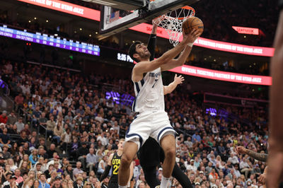 Oct 23, 2024; Salt Lake City, Utah, USA; Memphis Grizzlies forward Santi Aldama (7) attempts a shot during the second half against the Utah Jazz at Delta Center. Mandatory Credit: Chris Nicoll-Imagn Images