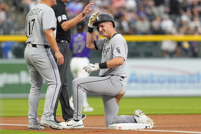 Jul 5, 2025; Denver, Colorado, USA; Chicago White Sox shortstop Colson Montgomery (12) triples in the first inning against the Colorado Rockies at Coors Field. Mandatory Credit: Ron Chenoy-Imagn Images