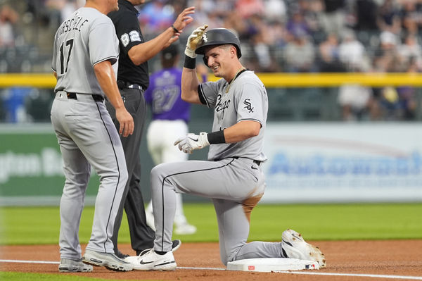 Jul 5, 2025; Denver, Colorado, USA; Chicago White Sox shortstop Colson Montgomery (12) triples in the first inning against the Colorado Rockies at Coors Field. Mandatory Credit: Ron Chenoy-Imagn Images
